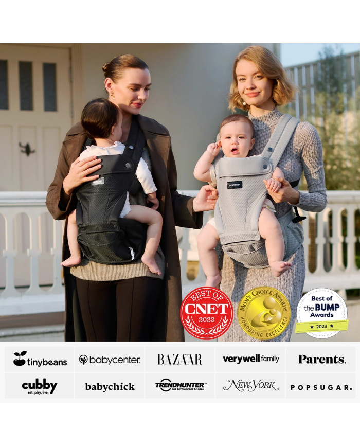 Dvi mamos lauke su juoda ir pilka Momcozy nešioklėmis